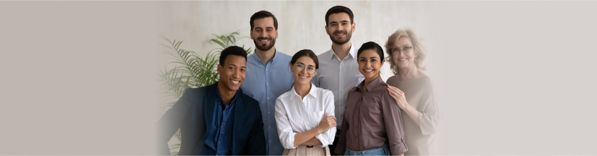Diverse happy business people successful employees team posing in office
